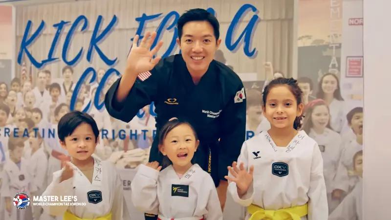 Master Lee with students at a Kick for a Cause event